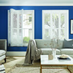 LL_2019_Shutters_Cotton_63mm_Classic_Frame_Full_Height_Bi-Fold_Main_Door_Open_Liv_MAIL